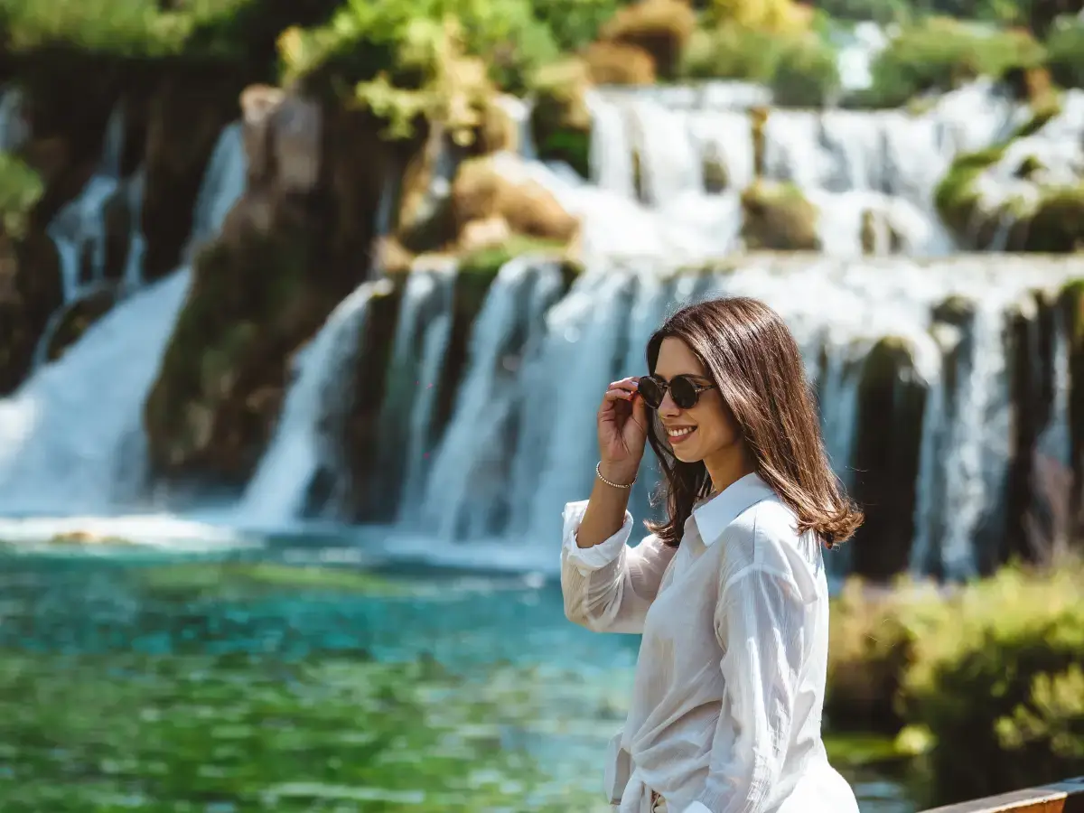 Picture this: you're strolling along the Krka waterfalls, the warm sun caressing your skin.